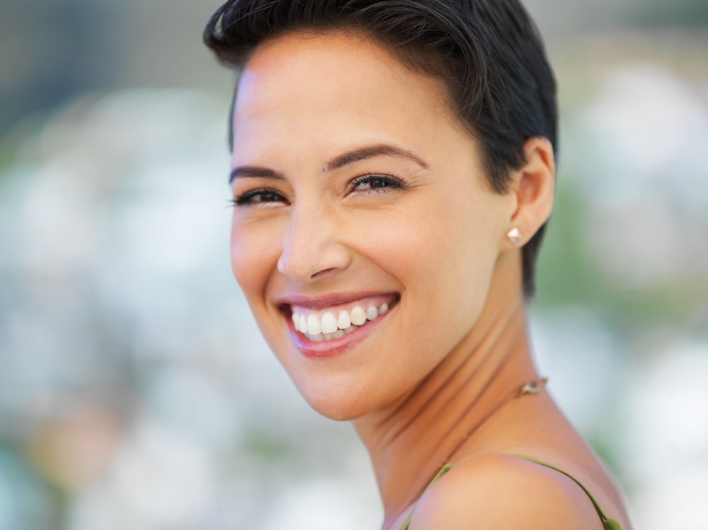 Closeup Girl Smiling with short brown hair